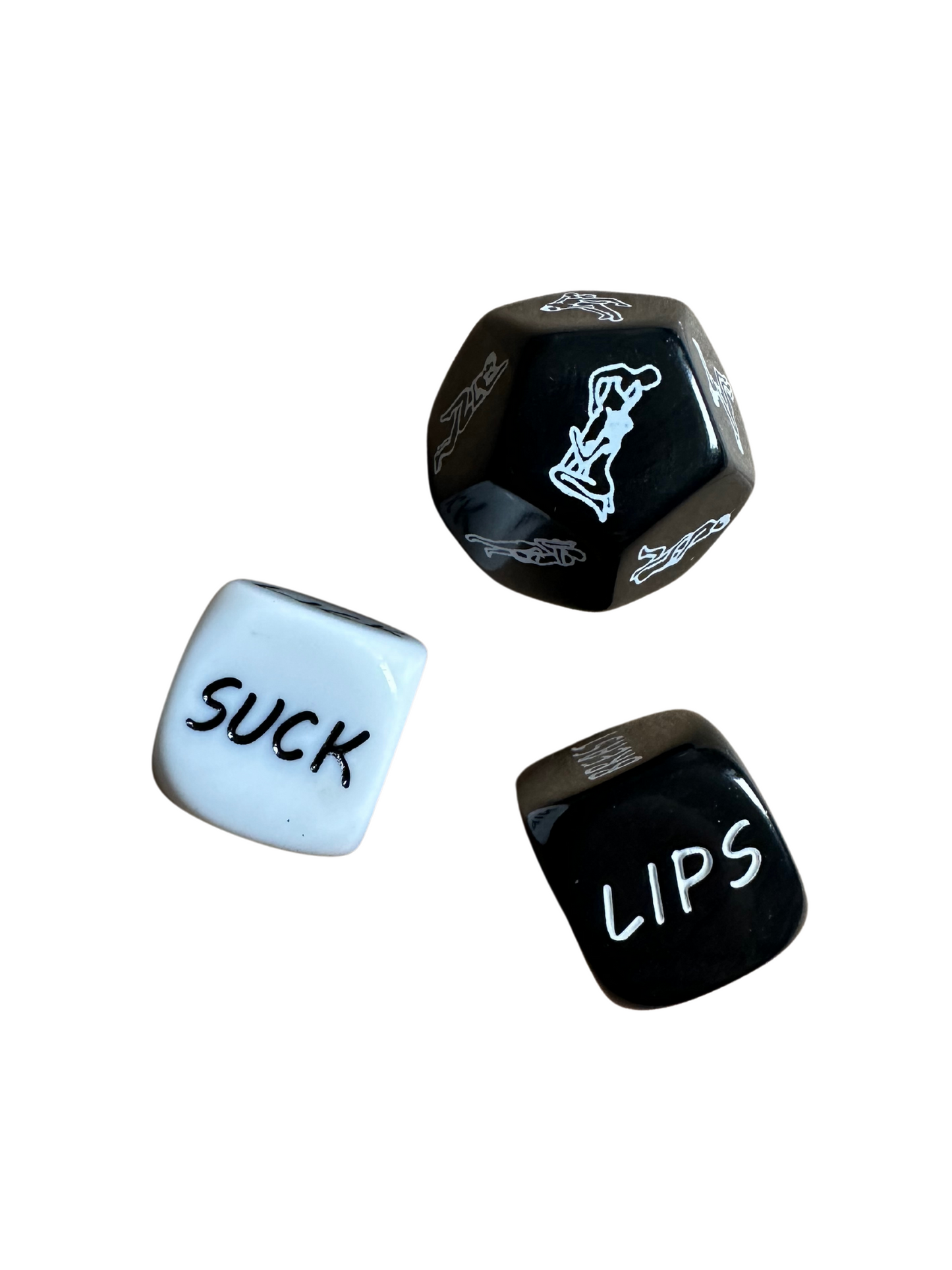 Black and white erotic dice set with body parts, positions, and actions