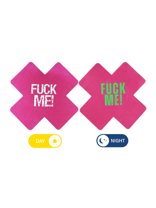 A set of glow-in-the-dark nipple pasties in pink, showing their appearance in daylight and how they glow at night.