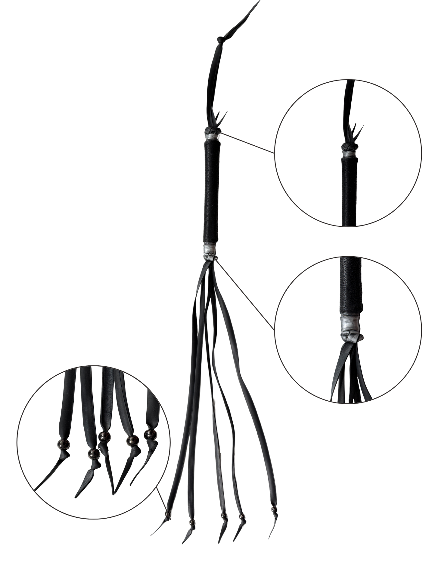 Zoomed detail of Blackthorn flogger showing handle texture and ball-tipped rubber strands