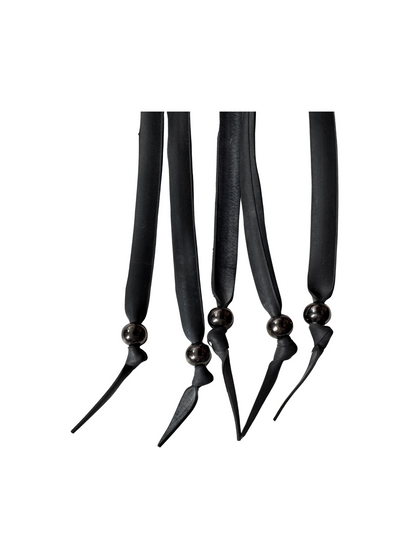 Close-up of ball-tipped recycled rubber tails on The Blackthorn flogger by Ludus Love