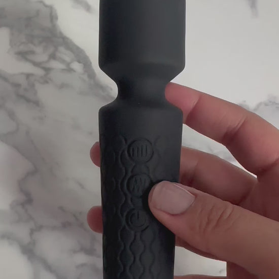 USB rechargeable black silicone wand vibrator, featuring 20 functions for tailored pleasure.