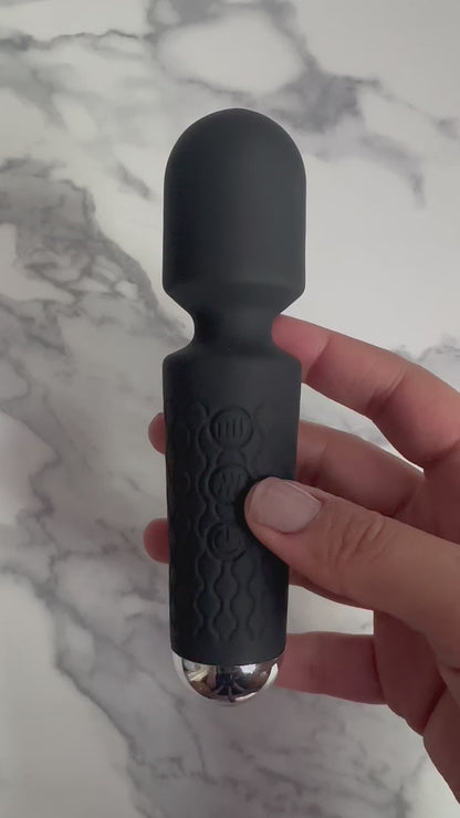 USB rechargeable black silicone wand vibrator, featuring 20 functions for tailored pleasure.