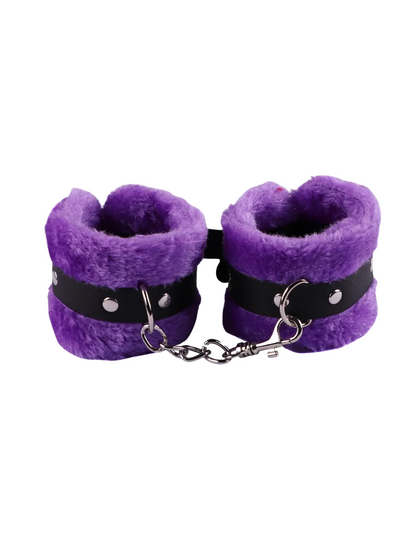 Purple furry handcuffs with faux fur and secure buckle, gender-inclusive and perfect for playful restraint.