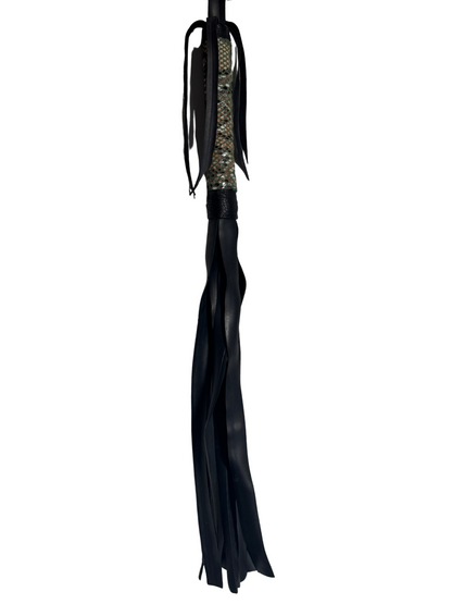 Full view of Ludus Love vegan flogger showing handle and long black falls